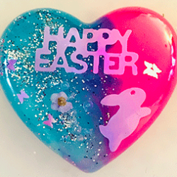 Easter Heart Decoration Yellow Letting with Blue and Pink Background
